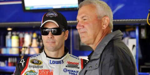 Dale Jarrett poses for a photo with Jimmie Johnson back in 2009.