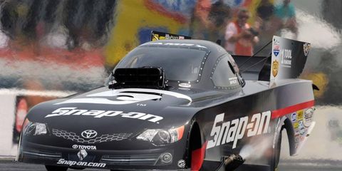 Cruz Pedregon topped Tim Wilkerson for the Funny Car prize in Texas on Sunday.