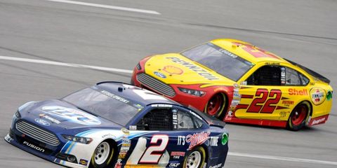 NASCAR on Tuesday reduced the suspensions for the Penske Racing crew chiefs of drivers Brad Keselowski (2) and Joey Logaon (22).