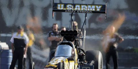 Tony Schumacher qualified first in the Top Fuel division of the NHRA even in Kansas on Friday.