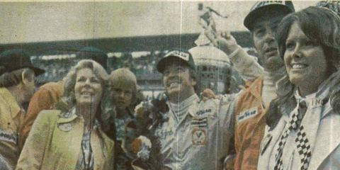 John Rutherford celebrates his 1976 Indy 500 win, and about a quarter of a million dollars in prize money.