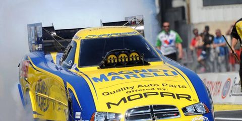 Matt Hagan earned the No. 1 qualifying spot in Funny Cars for Sunday's NHRA eliminations at Englishtown, N.J.