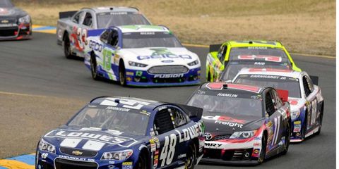 Jimmie Johnson (48) is still in front in the NASCAR Sprint Cup points race, but the pack behind him is growing.