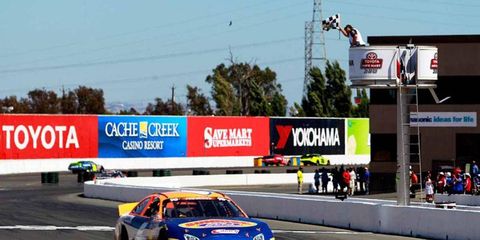 Derek Thorn takes the checkered flag in the NASCAR K&N Series win at Sonoma.