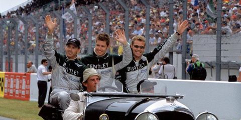 Bentley's victorious 2003 Le Mans team celebrates with a ride in a car that would have seemed familiar to the original Bentley Boys.