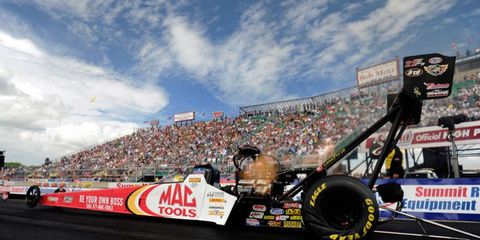 Doug Kalitta set the top speed on Friday and survived all NHRA challenges on Saturday at Norwalk.