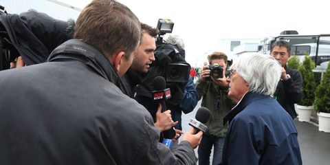 Bernie Ecclestone, right, is in the center of attention in Formula One following his indictment in Germany on bribery charges this week.