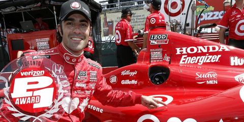Dario Franchitti won the pole for the weekend's opening race in Toronto. The race course is through the streets of the Canadian city.