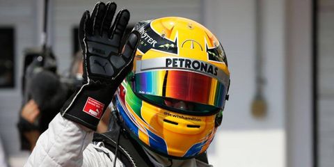 Lewis Hamilton will start Sunday's Hungarian Grand Prix from the pole after posting the fast lap in qualifying on Saturday.