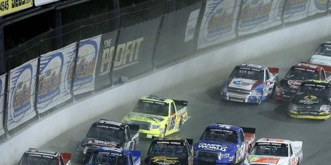 NASCAR trucks go five wide at Eldora. The series first dirt track race in decades went off without a hitch on Wednesday.