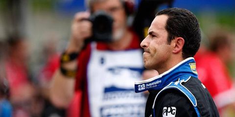 Helio Castroneves suffered minor injuries in a crash in Brazil on Friday.