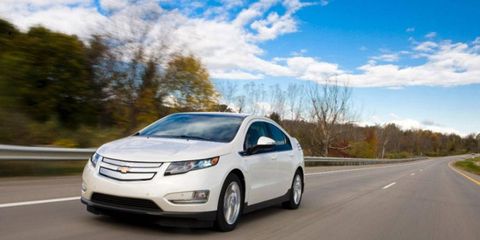 Citing increased competition from other hybrids and EVs, GM will cut Chevrolet Volt prices in 2014.