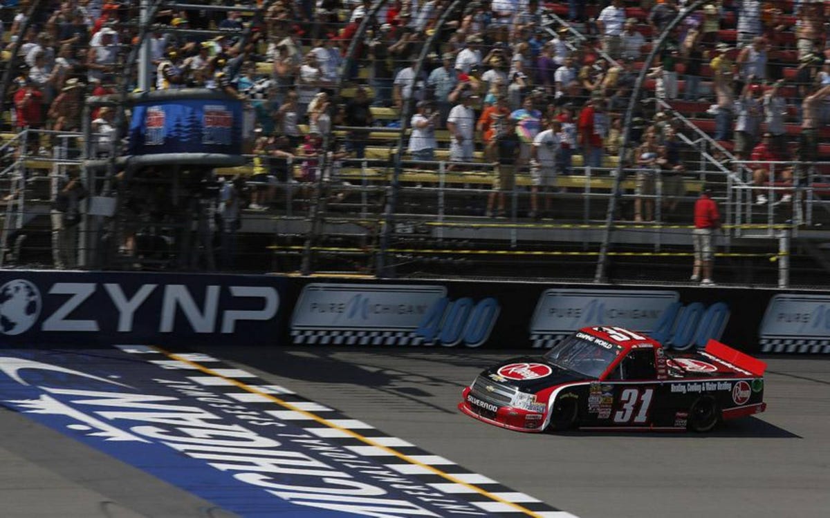 James Buescher passes Kyle Busch late for NASCAR Trucks win