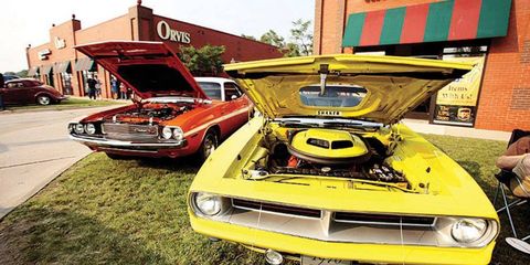 A 1970 Challenger R/T, left, and a 1970 'Cuda at the 2009 Woodward Dream Cruise.
