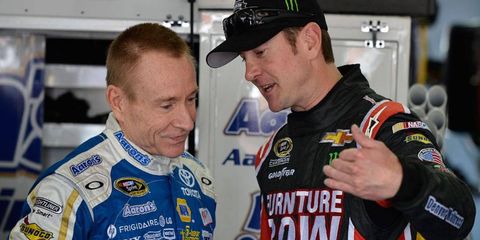 Kurt Busch, right, will be leaving Furniture Row Racing to join Stewart-Haas Racing in 2014. Mark Martin, left, is driving for SHR this season as a substitute for injured Tony Stewart.