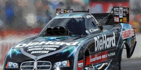 Matt Hagan shattered the track record at Indianapolis, and in the process, was the first qualifier in NHRA Funny Car action.
