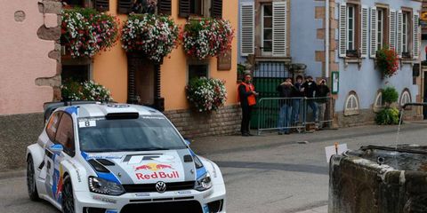 Sebastien Ogier, who has clinched the WRC points championship, was quickest at Rally France on Saturday. He trails Jari-Matti Latvala by just .1.5 seconds heading into Sunday.