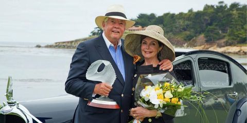 Peter and Merle Mullin celebrate their win at the Pebble Beach Concours.