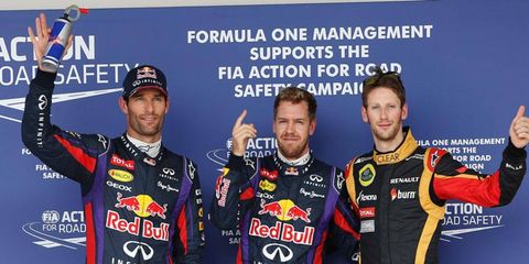 Mark Webber, pole sitter Sebastian Vettel and Romain Grosjean celebrate following qualifying at COTA on Saturday.