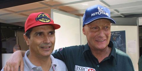 Nelson Piquet, left, and Niki Lauda in Brazil in 2002.
