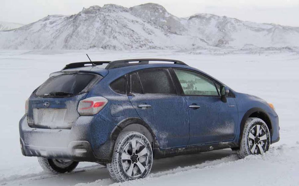 The XV Crosstrek Hybrid looks good with the rear side glass blacked out from volcanic ash.