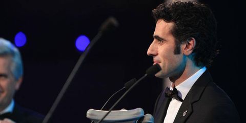 Dario Franchitti used crutches during his appearance at the Autosport Awards show in London.