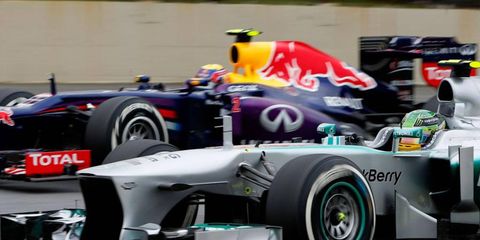 Formula One teams like Red Bull, above, and Mercedes may have to trim their budgets to meet a cap that the FIA plans to enforce beginning in 2015.