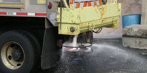 Municipalities from coast to coast spread salt on icy roads. Now, Milwaukee is adding cheese brine to the mix.