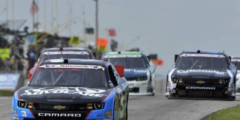 Austin Dillon leads Kyle Larson during a Nationwide race last year. This year, both drivers are rookies in the NASCAR Sprint Cup Series.
