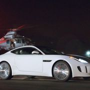 The 2014 Jaguar F-Type coupe stars alongside Sir Ben Kingsley, Tom Hiddleston and Mark Strong in the ad dubbed, "Rendezvous."