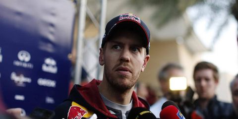 Red Bull's Sebastian Vettel faces reporters  last week after testing in Bahrain. Red Bull Racing has been plagued with issues this preseason.