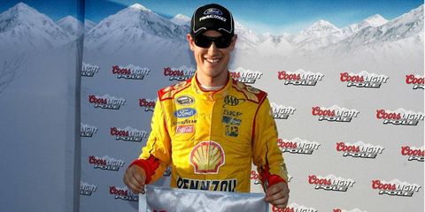 Joey Logano, who started second last week at Phoenix, beat teammate Brad Keselowski for the pole at Las Vegas on Friday.