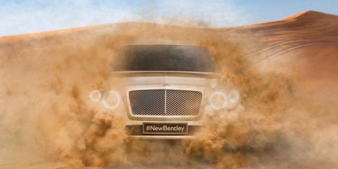 The Bentley SUV design features a taller grille and quad headlights in the style of the Continental GT.