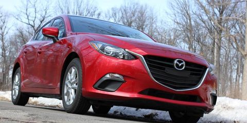 The 2014 Mazda 3i gets swoopy Kodo design and a fuel-efficient four-cylinder Skyactiv engine and transmission.