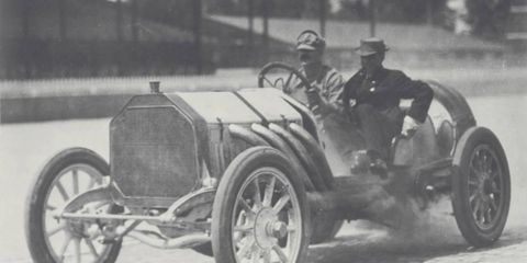 Louis Chevrolet behind the wheel of a 1910 Buick racer, driving for Billy Durant.