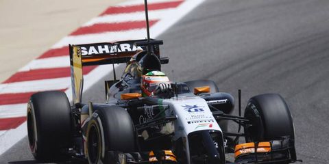 Force India's Sergio Perez zooms around the circuit in Bahrain during testing. Recently, Force India boss Vijay Mallya publically defended the new F1 rule changes.