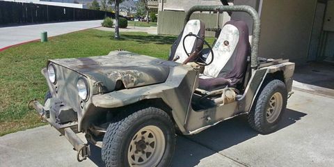 The seller says this truck has its share of "DENTS!" That's fine with us. What "MILITARY JEEP" from 1966 wouldn't have dents?