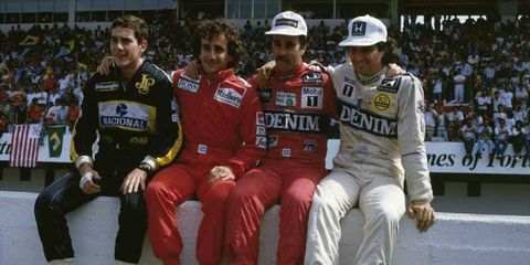From left to right: Ayrton Senna (Team Lotus), Alain Prost (McLaren TAG Porsche), Nigel Mansell and Nelson Piquet (both Williams-Honda) at the 1986 Portugese Grand Prix.