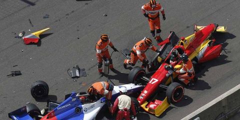 Sebastian Saavedra and Mikhail Aleshin crashed after the standing start at the Grand Prix of Indianapolis.