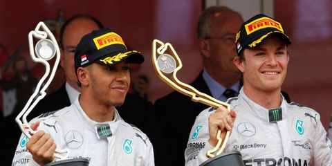 Lewis Hamilton, leff, and Nico Rosberg are proving that teammates don't have to be friends to be successful in Formula One.