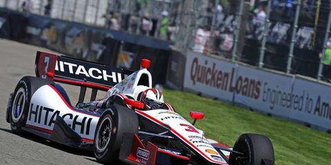 Team Penske driver Helio Castroneves won the pole on Saturday for the opening race in Detroit.