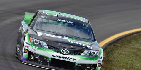 Denny Hamlin set a track qualifying record with a lap of 181.415 mph at Pocono on Friday.
