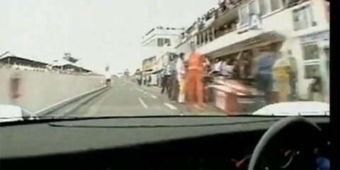 Derek Bell behind the wheel of a Porsche 956.