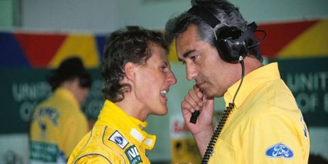 Michael Schumacher, left, and Benetton team boss Flavio Briatore from 1992.