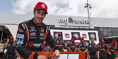 Simon Pagenaud shows off the sticker in Houston today after winning his first career IndyCar Series pole.