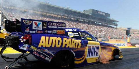 Ron Capps grabbed his first NHRA Funny Car win of the season on Sunday at New England Dragway.