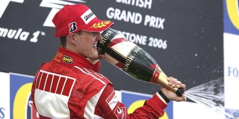 Michael Schumacher stands on the podium after the 2006 British Grand Prix.