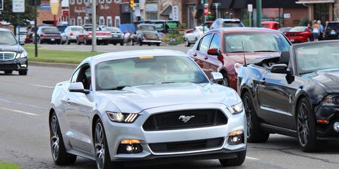 A 2015 Ford Mustang makes a cameo appearance.
