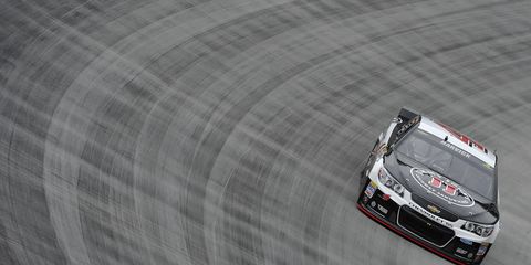 Kevin Harvick captured his fifth NASCAR Sprint Cup pole of the season on Friday night.