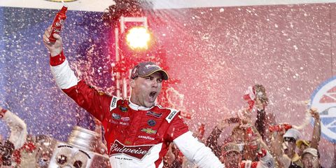 Kevin Harvick wins at Charlotte and will advance to the next round of the Chase.